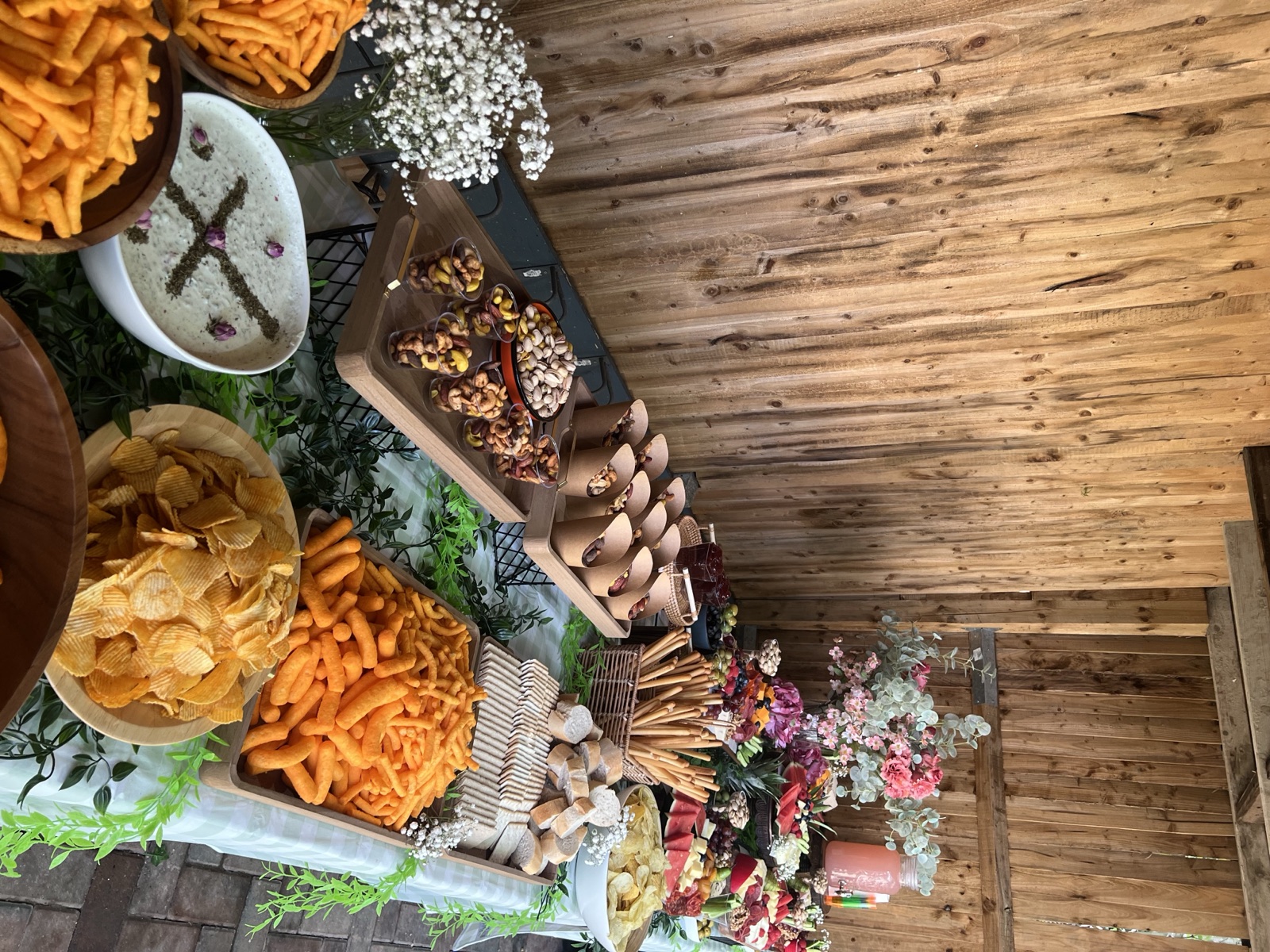 Sharing table of savoury bites and dips for an event